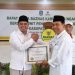LAZISNU Nganjuk Terima Penghargaan Sebagai Mitra Kerja Produktif dari Baznas Nganjuk