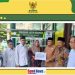 Kyai Ahsanul Haq WAKA II Baznas Jatim Pandu Langsung Pendistribusian Bantuan Rombong Pelaku UMKM