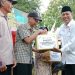 BAZNAS Nganjuk Tunjukkan Kepedulian Lewat Bantuan Sosial di Pembukaan TMMD 2025