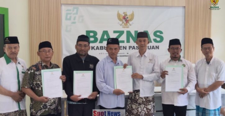 Baznas Pasuruan Gandeng PCNU Distribusikan Zakat Fitrah untuk Dhuafa